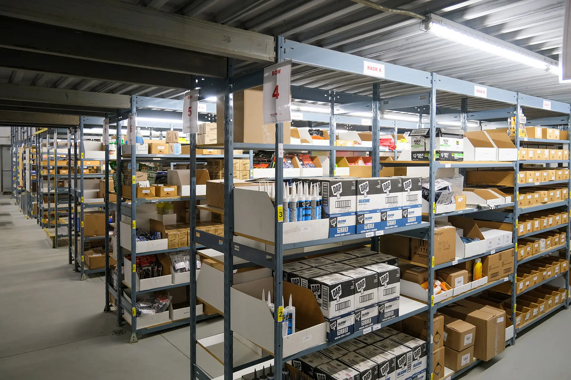 a industrial warehouse shelves full of stock