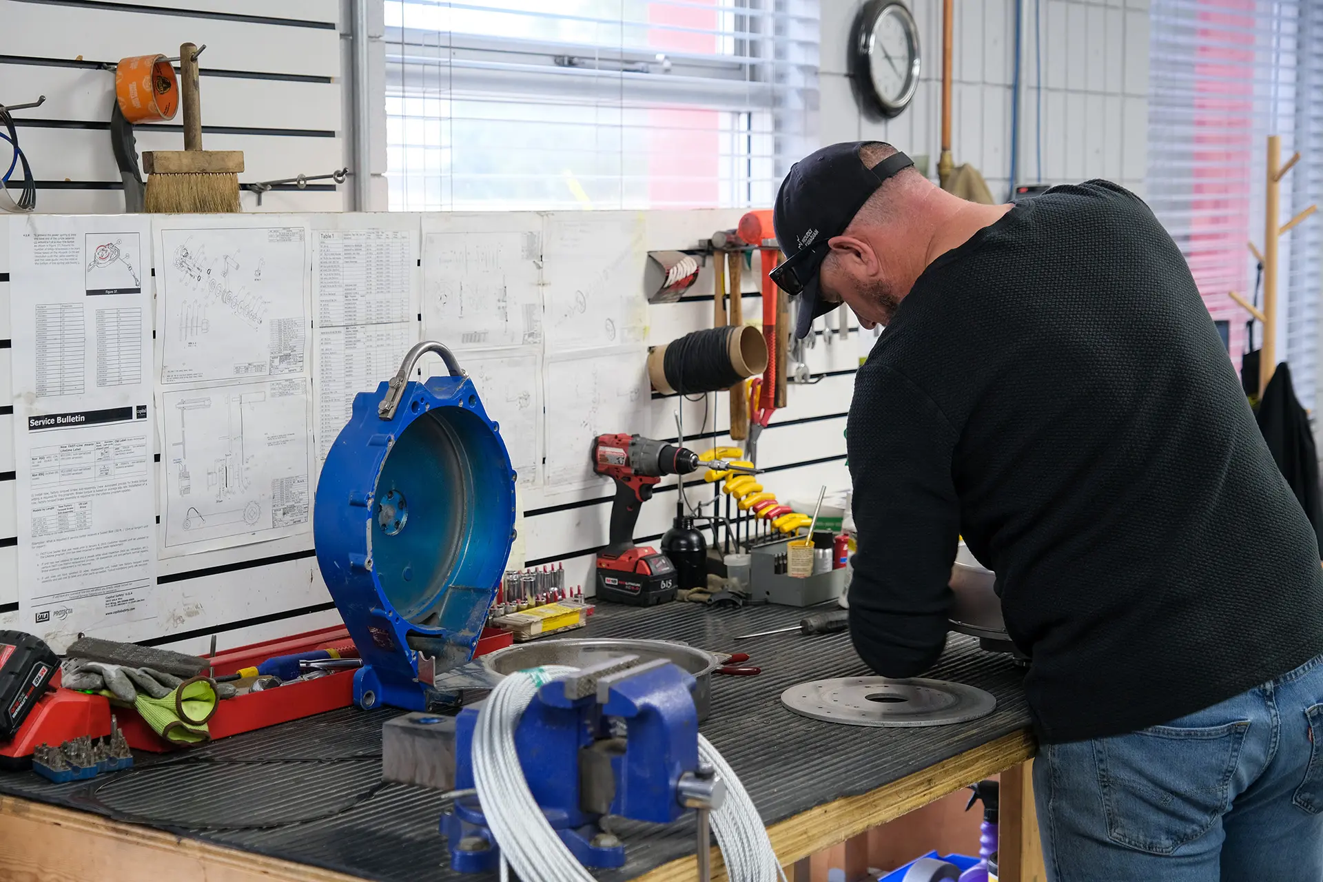 a man in a shop with tools